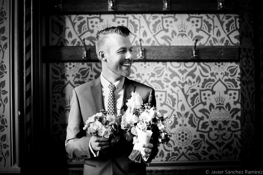 groom with the flowers