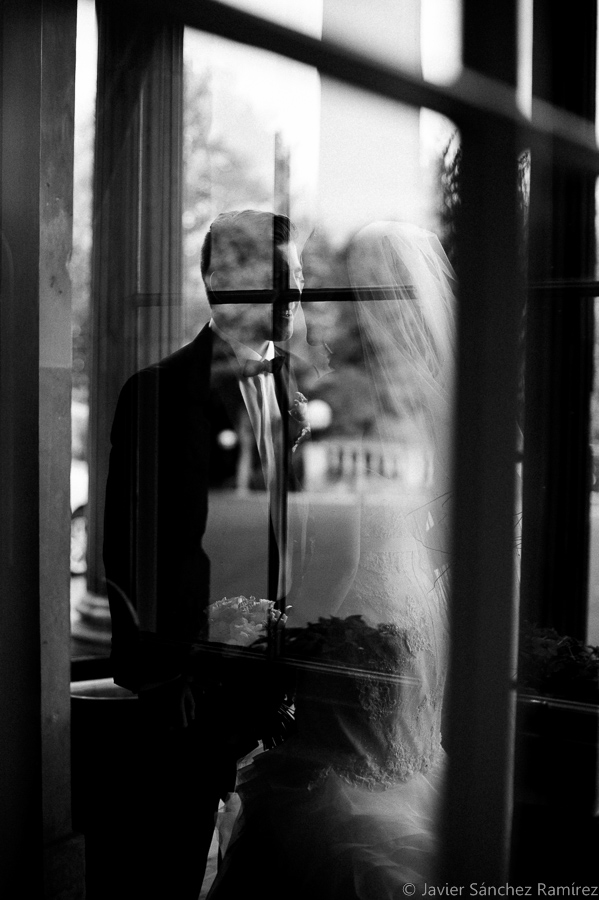 Natural weddings photographer Through windows